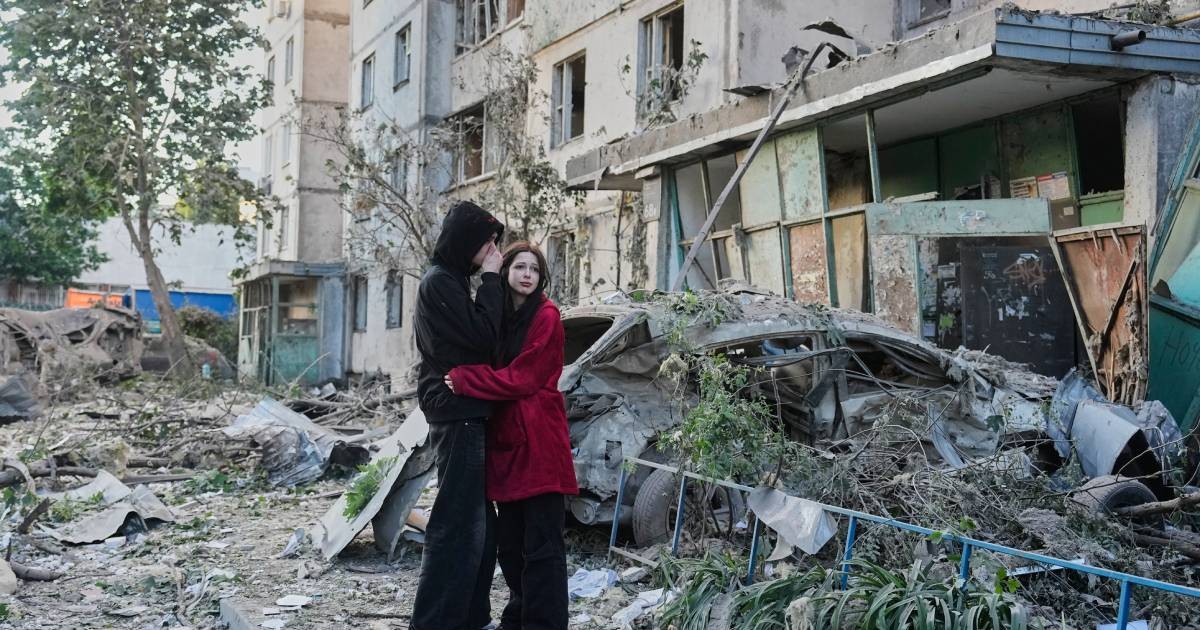 Russian attack on Ukraine kills at least 11 and traps others in damaged buildings