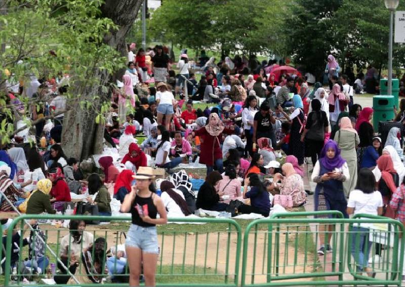 Coronavirus: MOM will revoke work passes of migrant workers in large gatherings if they refuse to disperse