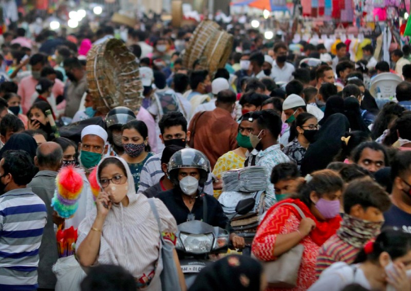 India locks down some towns as coronavirus cases hit 5-month high