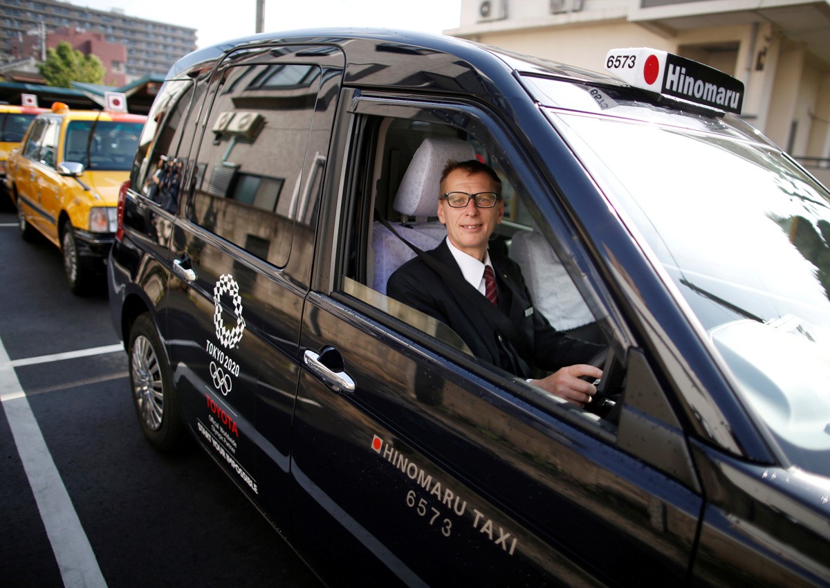 Tokyo tackles tourist boom with accessible taxis - and drivers who speak foreign languages