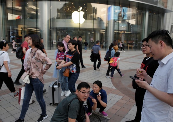 Will Apple's roots in China hold fast amid political storm?