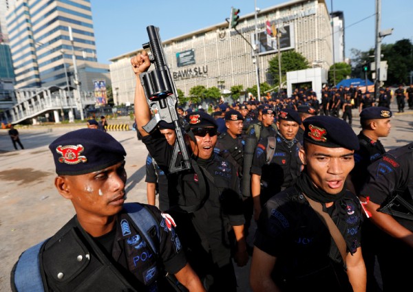 Indonesian troops flood Jakarta streets after post-election riots