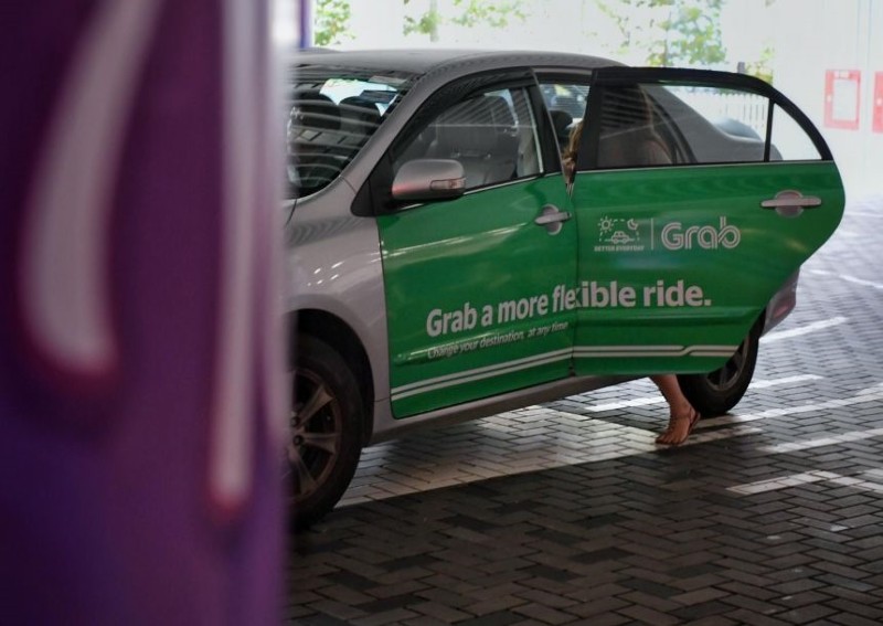Grab to raise fares by $1, says it's to improve drivers' earnings