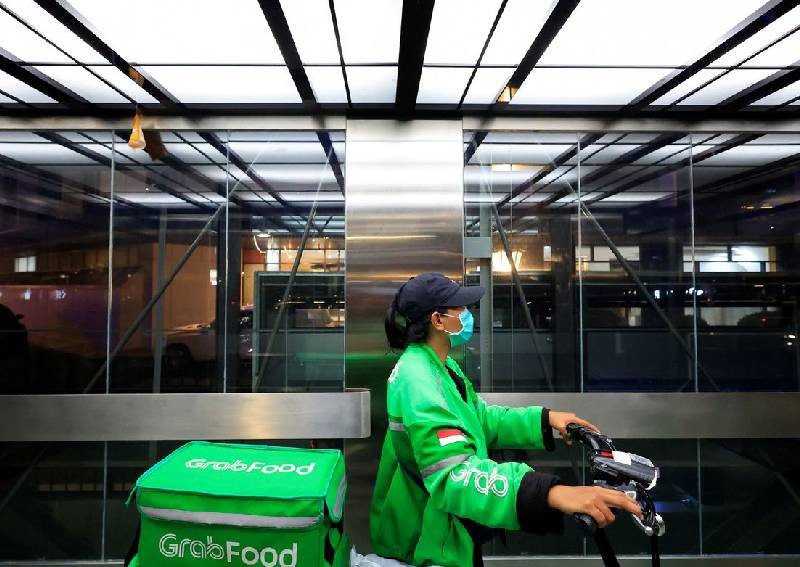 Grab sees rebound in ride-hailing as offices reopen