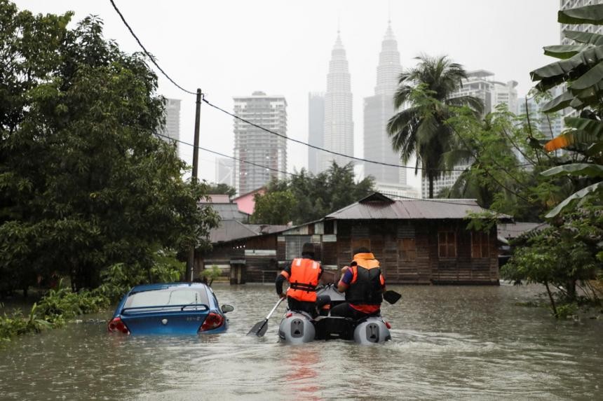 'Surprise' urban Malaysia floods drive pleas for climate action