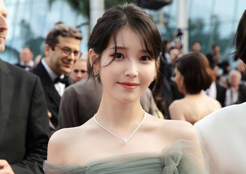 IU pushed by French influencer at Cannes, Jamie Lee Curtis sparks debate asking Korean actor to hold her handbag, D.P. season 2 adds new cast 