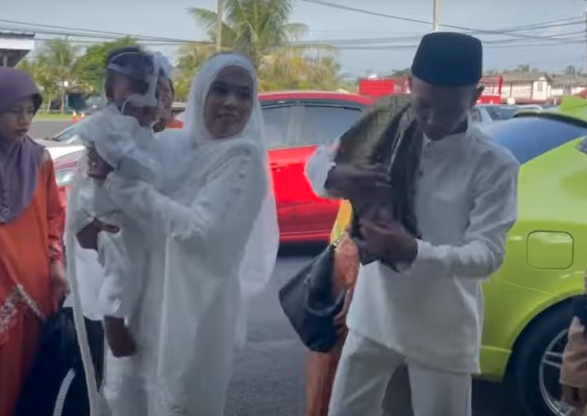 Malaysian couple who went viral for riding motorbike with sick baby on respirator get married
