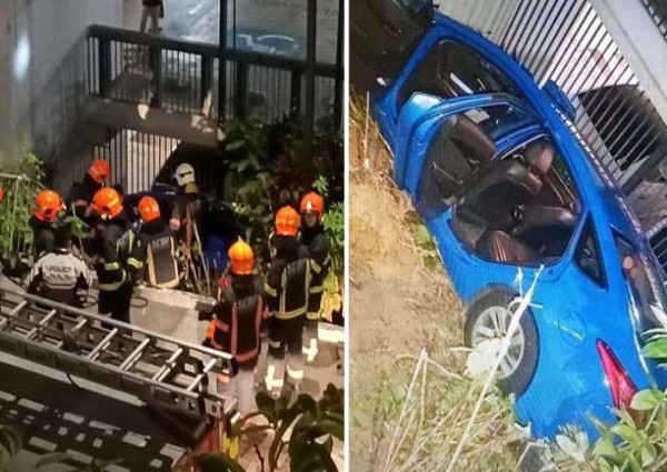 Female cabby and passenger taken to hospital after taxi crashes through railing at Keat Hong Close