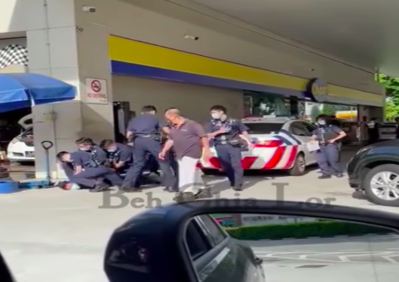 Man nabbed after hurling vulgarities, challenging police officers to a fight at Bukit Timah