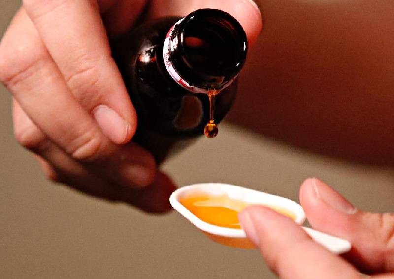 Indonesia revokes firms' fever syrup licences amid inquiry into 150 child deaths
