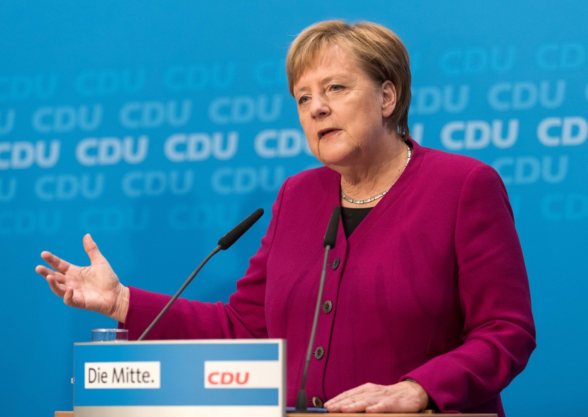 Angela Merkel to give up party leadership after poll setback