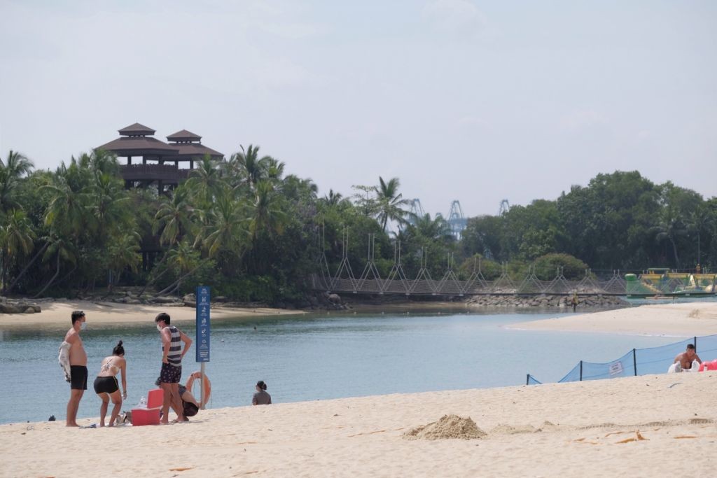 Sparse crowds at Sentosa beaches on first day with online booking requirement