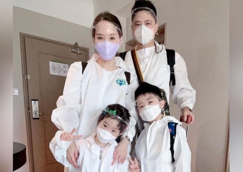 Former actress Yvonne Lim and family in full PPE for flight back to Taipei