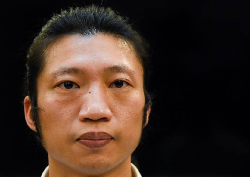 I was kicked and punched at China's UK consulate, protester says