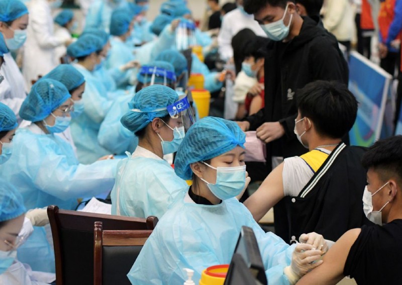 Beijing steps up Covid-19 measures as cases quadruple