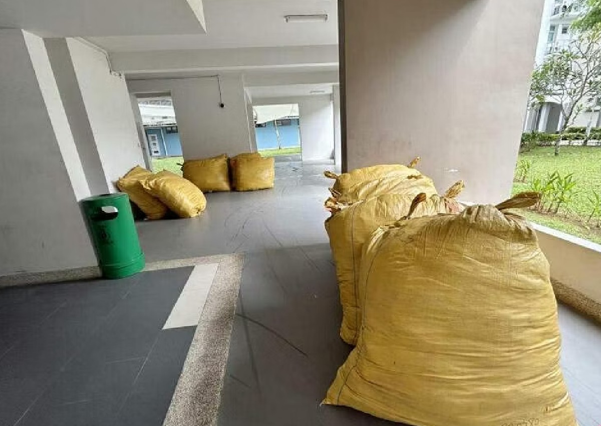 No doorstep delivery? Man buys over 1,000kg of clothes, gets upset over items left at void deck