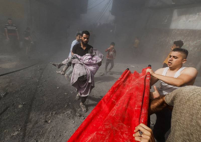 Israeli troops raid Gaza as Arab nations condemn bombardment