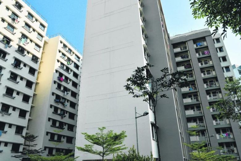 How much cheaper are flats in Johor compared to Singapore?