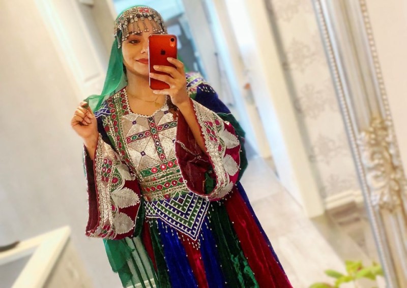 'This is how we dress': Afghan women overseas pose in colourful attire