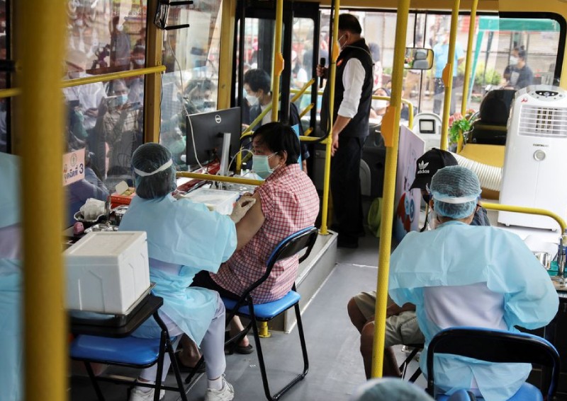All aboard! Thai bus brings vaccines to Bangkok's vulnerable
