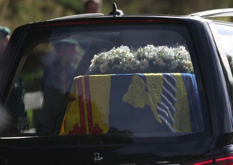 Queen Elizabeth's coffin travels through Scotland on 'last great journey' as mourners line streets