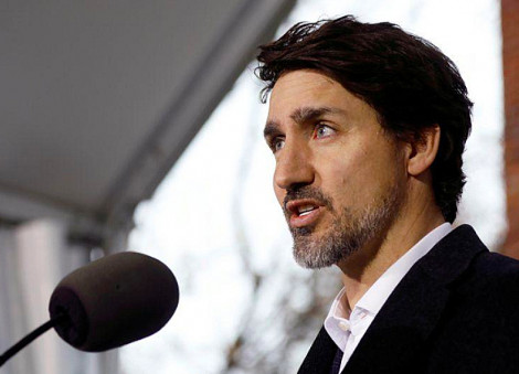 Canada PM says will not retaliate against US over block of mask exports