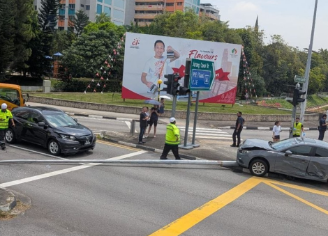 Fallen lamp post obstructs Jurong road after 3-car accident; buses diverted