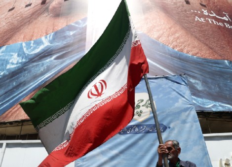 US says it struck Iranian military sites, Tehran responds with air base attack