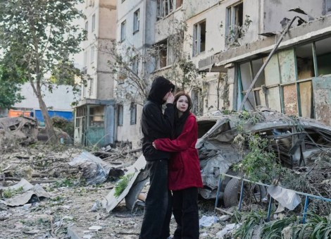 Russian attack on Ukraine kills at least 11 and traps others in damaged buildings