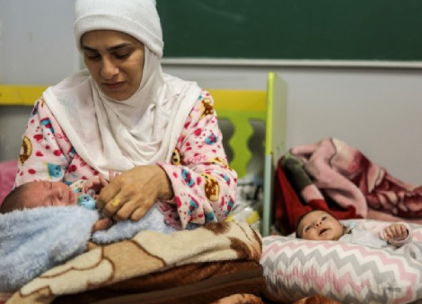 Displaced mothers in Lebanon welcome babies' new lives with hope and fear