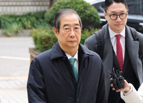 South Korea appeals court cuts jail sentence for ex-PM Han Duck-soo to 15 years
