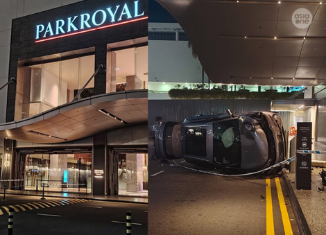 Car lands on side along Marina Bay hotel driveway after accident with taxi; female passenger and infant daughter taken to hospital
