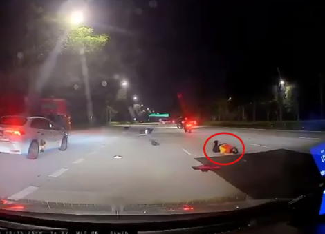 Motorcyclist skids, falls on SLE due to debris on road