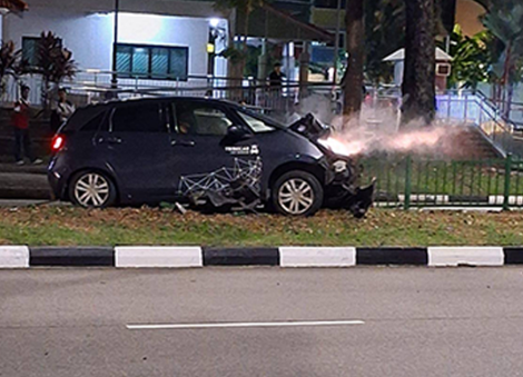 Tribecar vehicle mows down centre railings along road in Yishun, believed to have skidded
