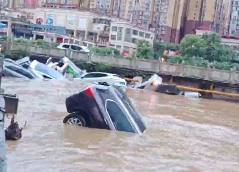 At least 21 killed as heavy rains drench southern, central China