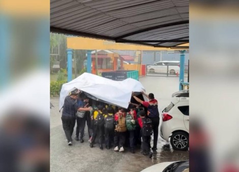 Daily roundup: Teachers in Malaysia earn praise for shielding students from heavy rain in heartwarming video — and other top stories today