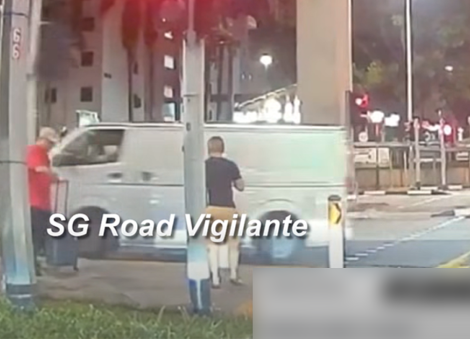 Van crashes onto traffic island, narrowly missing pedestrians; police looking for driver
