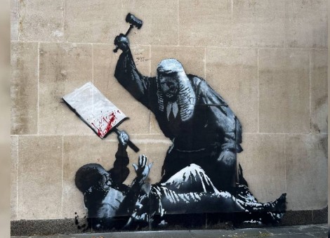 New Banksy mural at London's High Court shows judge striking protester