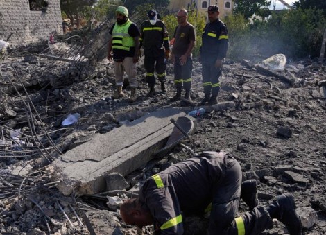 Israeli airstrikes on a village in southern Lebanon kill 9 people, wound 13