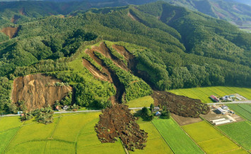 Japan quake, landslides leave at least 9 dead