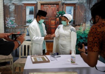 Wedding streamers: Indonesia couple takes big day online to keep coronavirus at bay