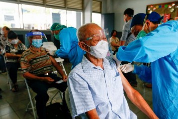 Tempers flare in Indonesia as the privileged few get vaccinated ahead of the queue