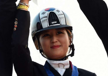 Daughter of ousted South Korean president's confidante arrested in flight