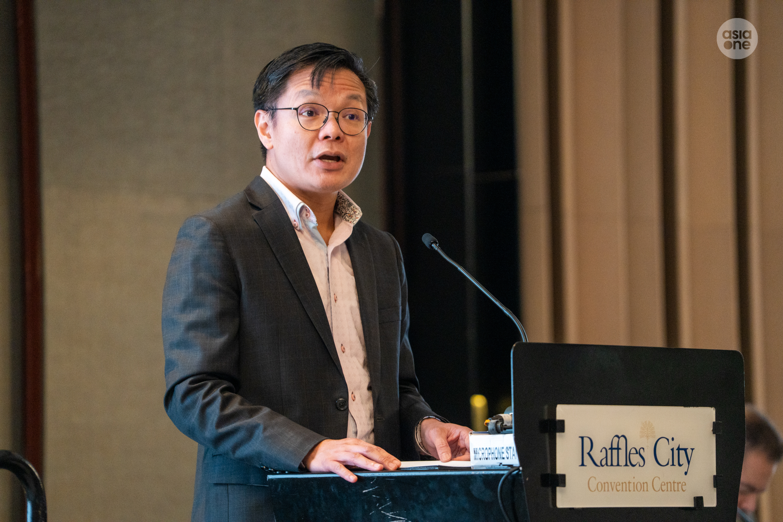 IMDA chief executive Ng Cher Pong giving his opening address at the plenary meeting on Monday (April 20).