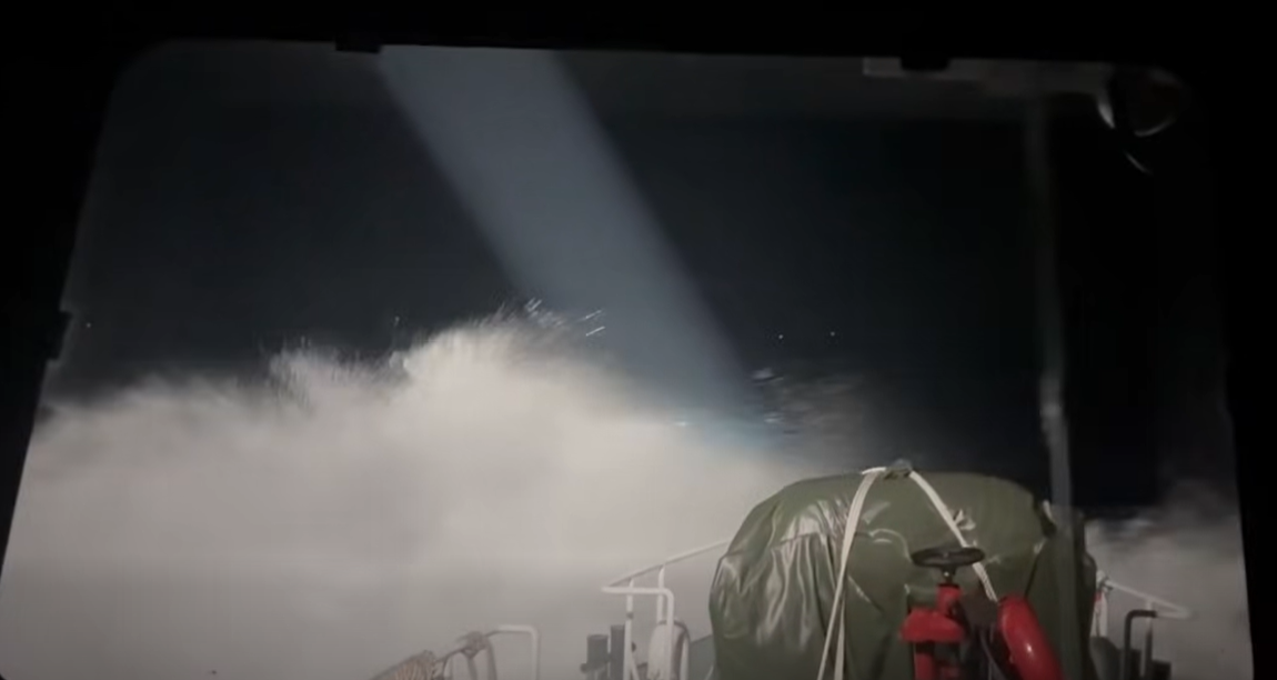 Rescuers face strong winds and high waves at the search area.