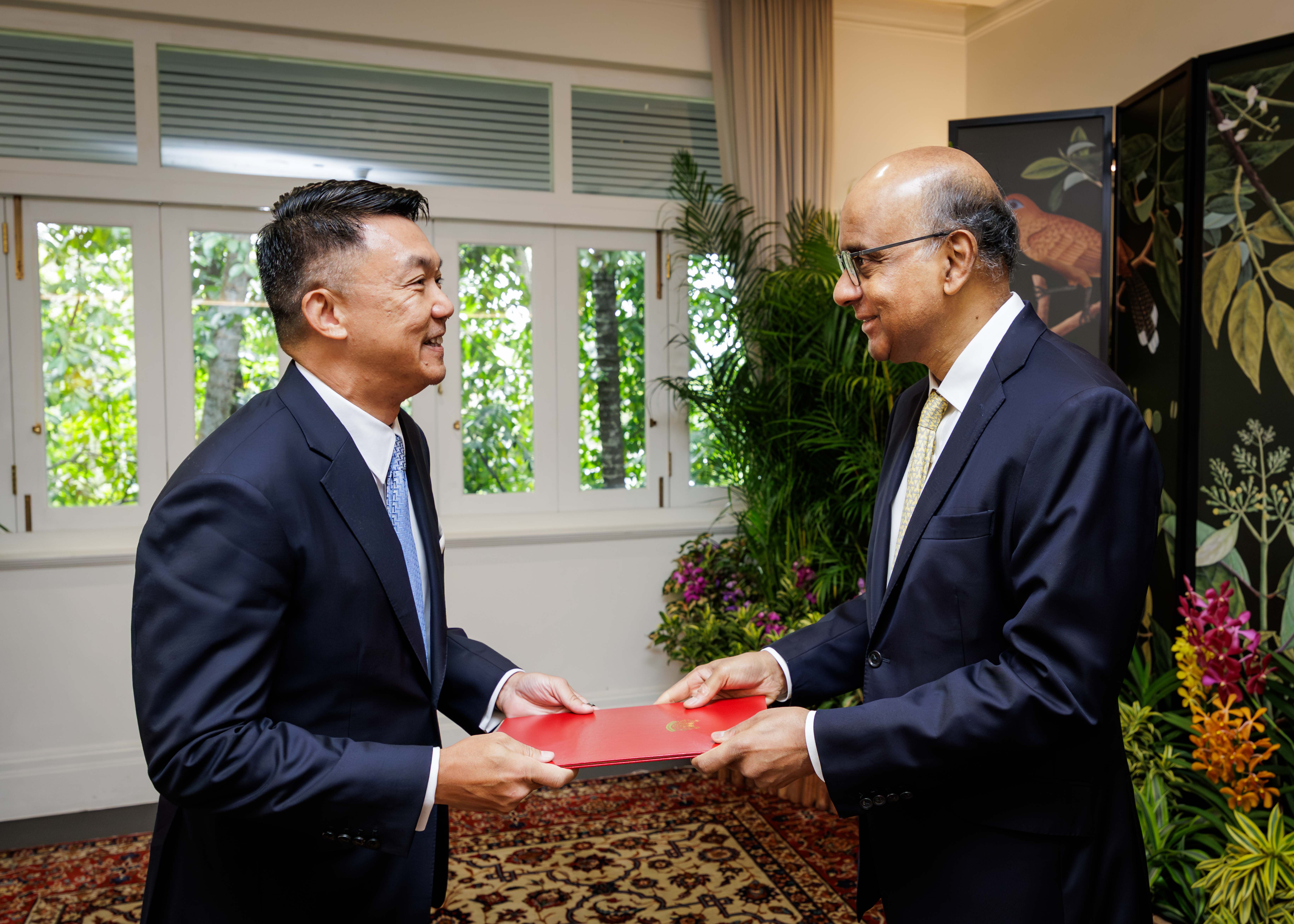 Yip Wei Kiay (left), receiving his letter of credence from President Tharman Shanmugaratnam on Tuesday (Jan 27).
